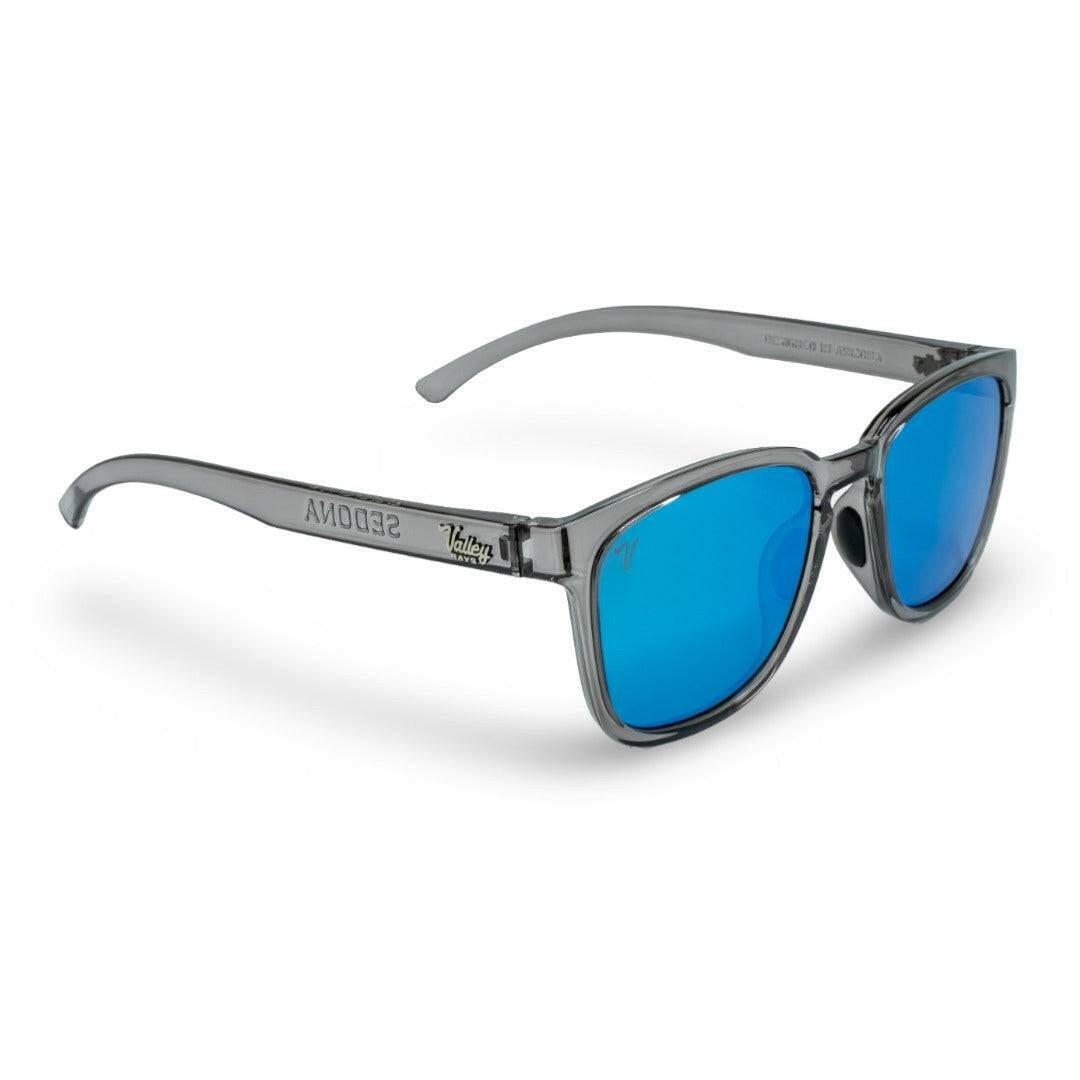 2024 popular Sedona sunglasses with crystal grey frame and polarized sky blue lens featuring top-quality 2mm nylon lens for clarity, durability, and scratch resistance. Includes best-in-industry bio resin TR90 frame with Valley Rays logo on the temple arm